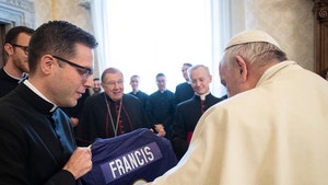 Lamar Jackson Signs Personalized Ravens Jersey For Pope Francis