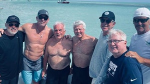 Troy Aikman Flaunts Ripped Abs in Shirtless Boat Pic with Jimmy Johnson!