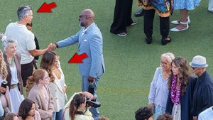 Jessica Alba and Cash Warren at daughters graduation backgrid 2