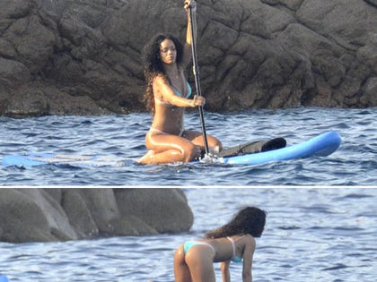 0902_rihanna_bikini_paddle_board_photos_launch