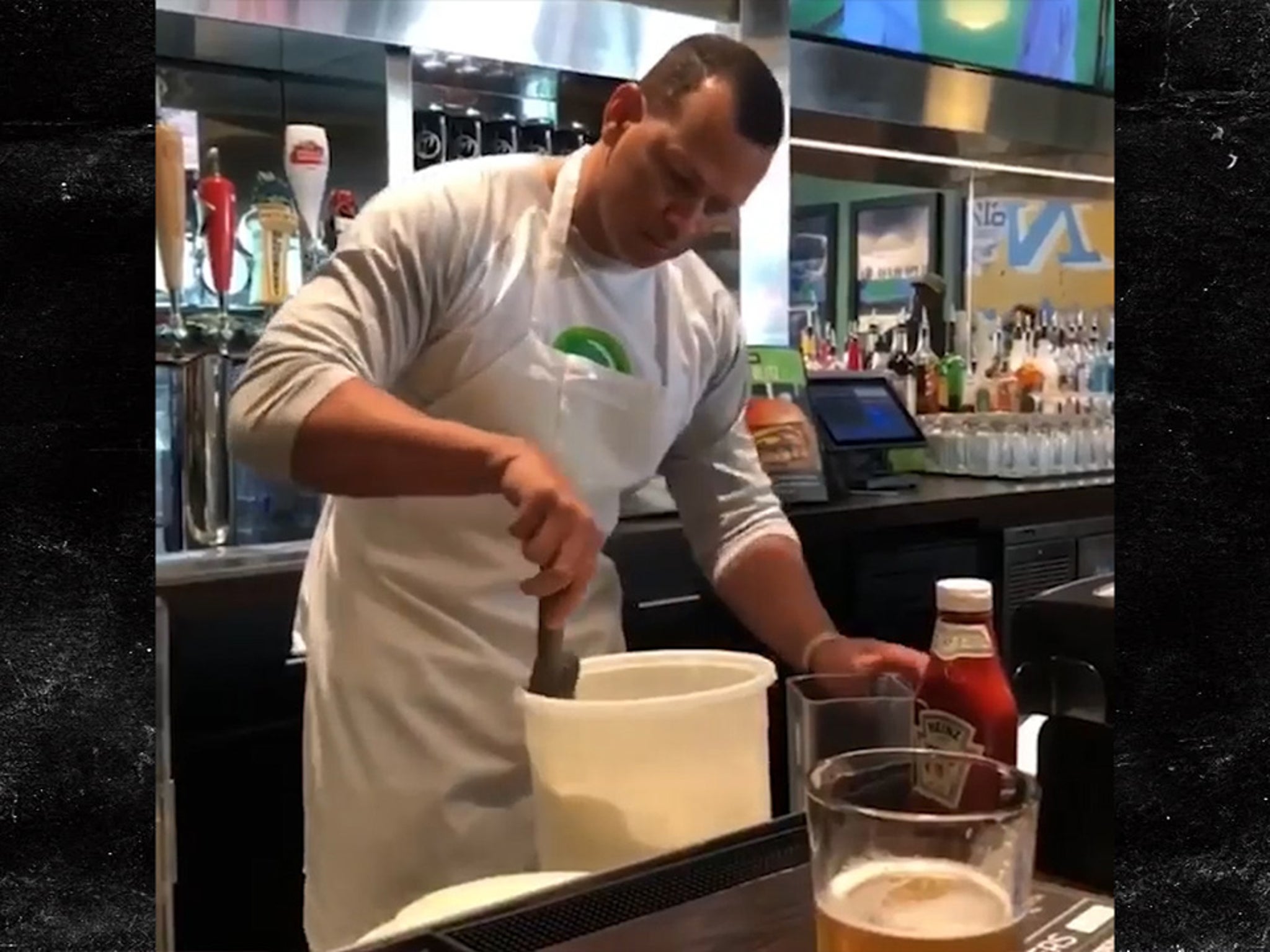 Alex Rodriguez works at Wahlburgers after losing a Red Sox bet to