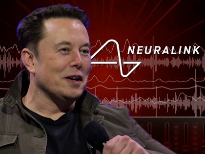 Elon Musk smiling next to the words Neuralink