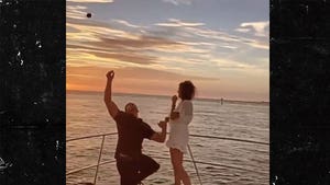 Hysterical Video of Wedding Proposal When Ring Goes Overboard
