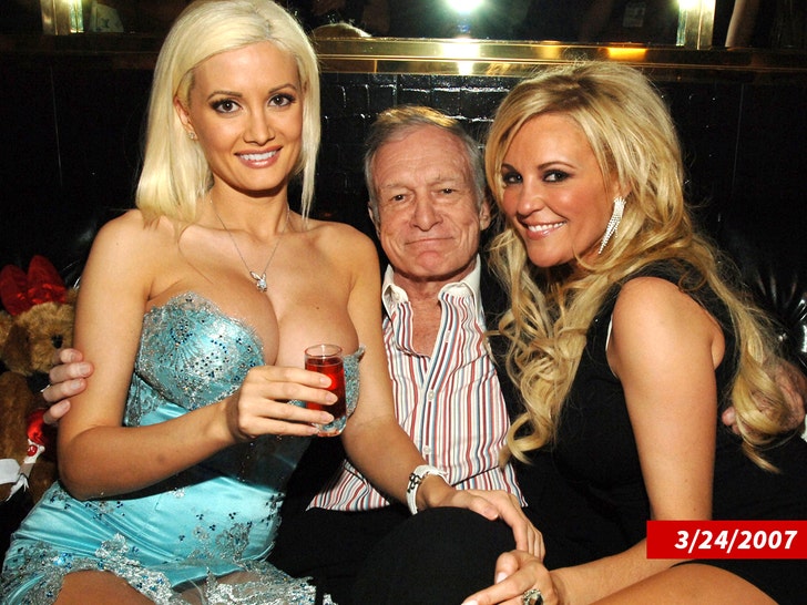 1022 Holly Madison, Hugh Hefner and Bridget Marquardt Denise Truscello-WireImage