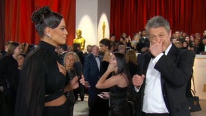 Hugh Grant Blows Off Ashley Graham during Oscars Red Carpet Interview