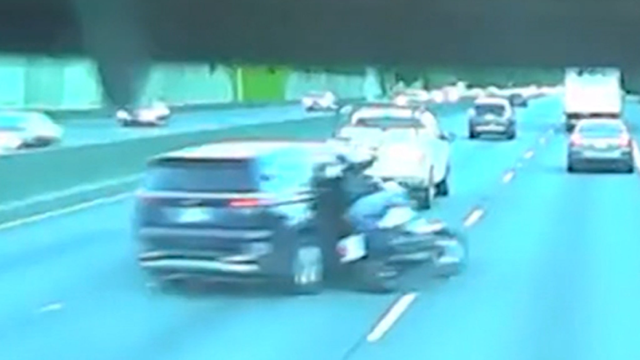 Minivan Swerves Into Motorcyclist, Mowing Down Rider in Road Rage, on Video