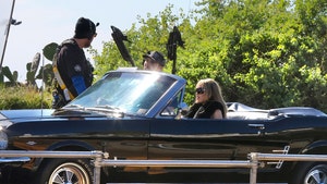 miley-cyrus-gallery-launch-backgrid-1