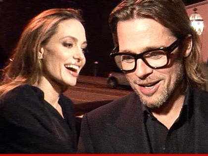 0828-angelina-brad-tmz-01