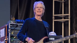 Phil Lesh Playing A Bass Guitar On Stage