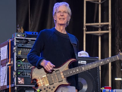 Phil Lesh Playing A Bass Guitar On Stage