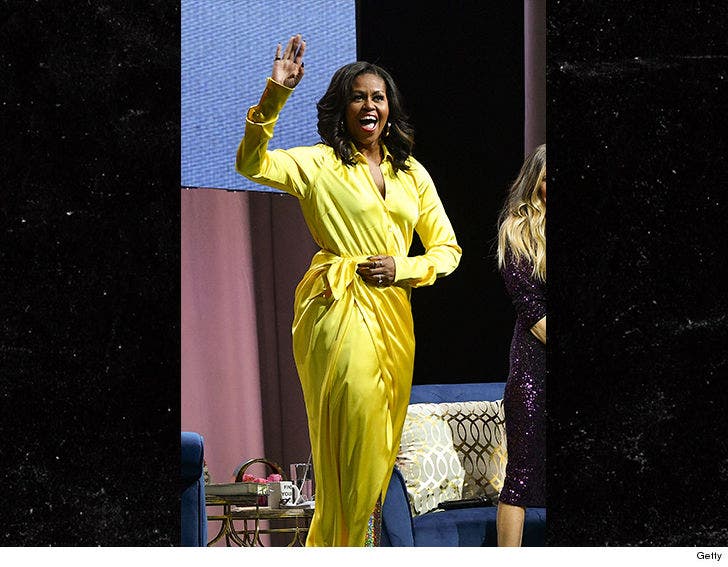 michelle obama yellow dress with boots