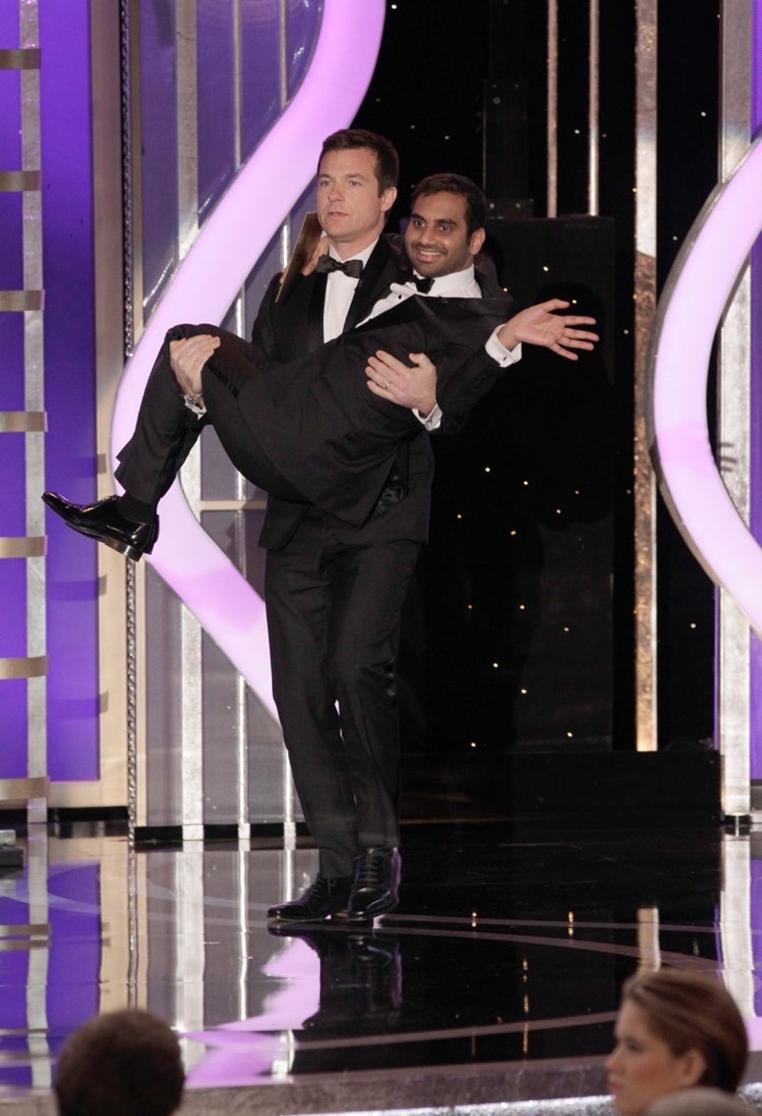 2013 -- Jason Bateman comedically takes the stage and carries Aziz Ansari to present the award for Best Actress in a TV series, comedy or musical.