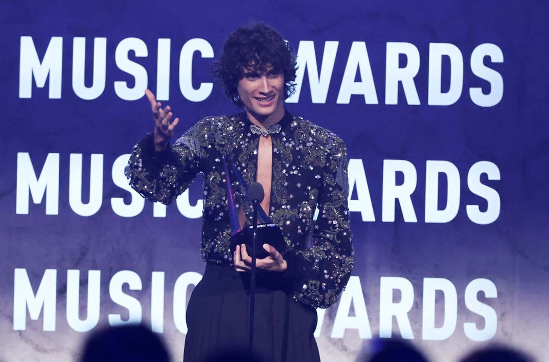 Sombr accepts the Best Rock_Alternative Song award for 