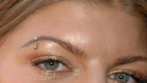 1995 to Fergie: I Want My Brow Piercing Back!