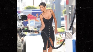 Nicole Murphy Pumps It Real Good at Beverly Hills Gas Station