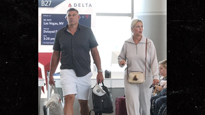 sub Mike Vrabel and wife Jennifer backgrid
