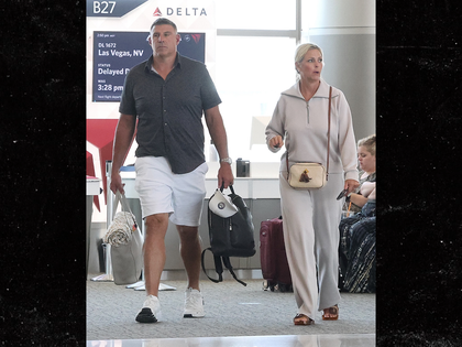 sub Mike Vrabel and wife Jennifer backgrid