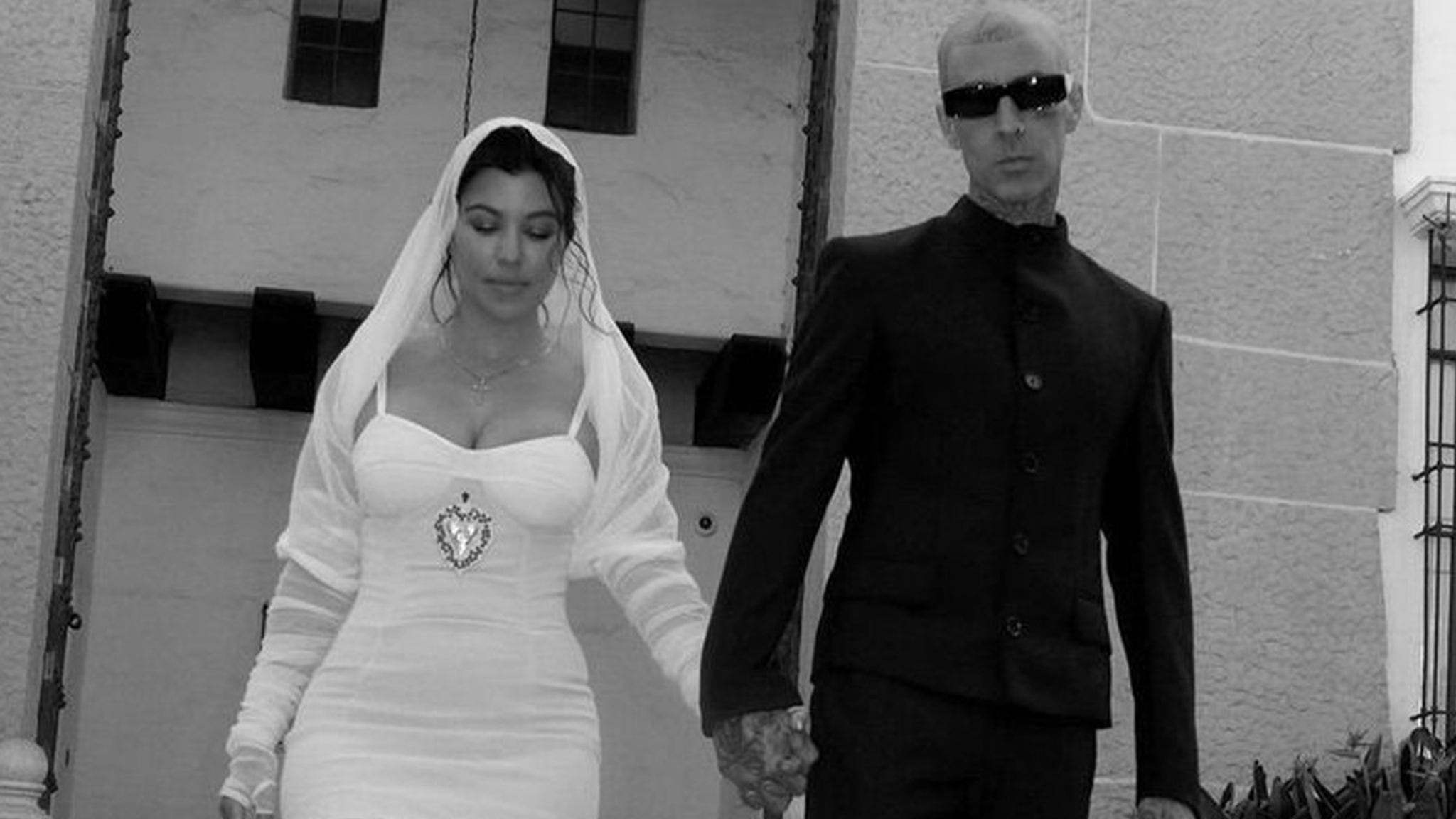 Kourtney Kardashian wears traditional bridal attire to marry Travis Barker  in Italy: Photos