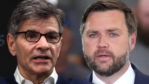 George Stephanopoulos and J.D. Vance are seen next to each other. George is wearing a navy blue sweater and a white shirt, while J.D.'s wearing a blue jacket, a white shirt, and a patterned tie.