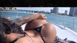 Kyle Kuzma Gets a Handful of Booty on Boat Trip with Thonged-Out Model