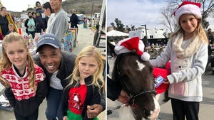 1222-Sugar-Ray-Leonard-Hands-Out-Christmas-Gifts-At-Kids-Party-primary-5