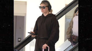 Ariana Madix Somber at LAX After Paying Tribute to Late Friend Ali Rafiq