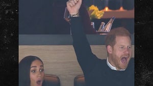 Meghan Markle and Prince Harry Surprise Crowd at Vancouver Hockey Game