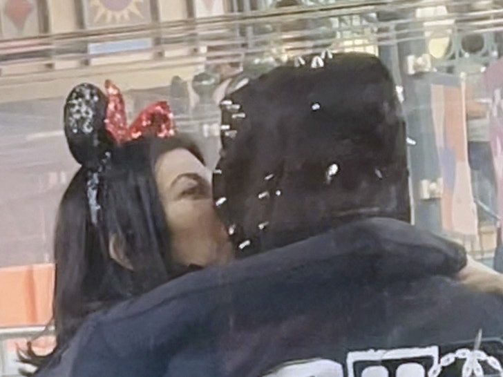 Kourtney Kardashian and Travis Barker Pack on PDA at Disneyland Paris