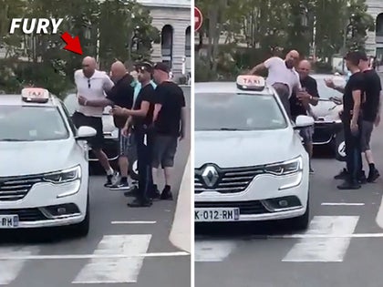 Tyson Fury Attempts To Kick Cabbie's Car After Apparent Tiff With Driver In France