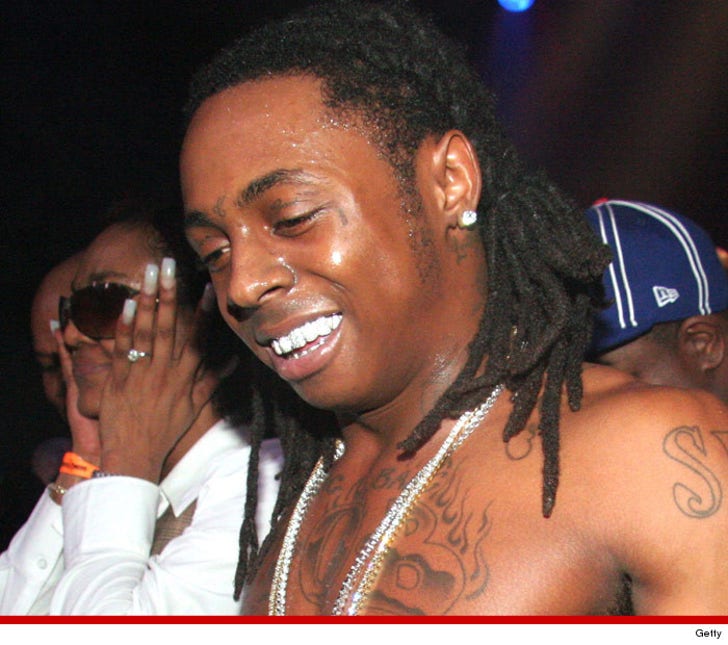 Lil Wayne Tattoos The Power Symbol On His Face
