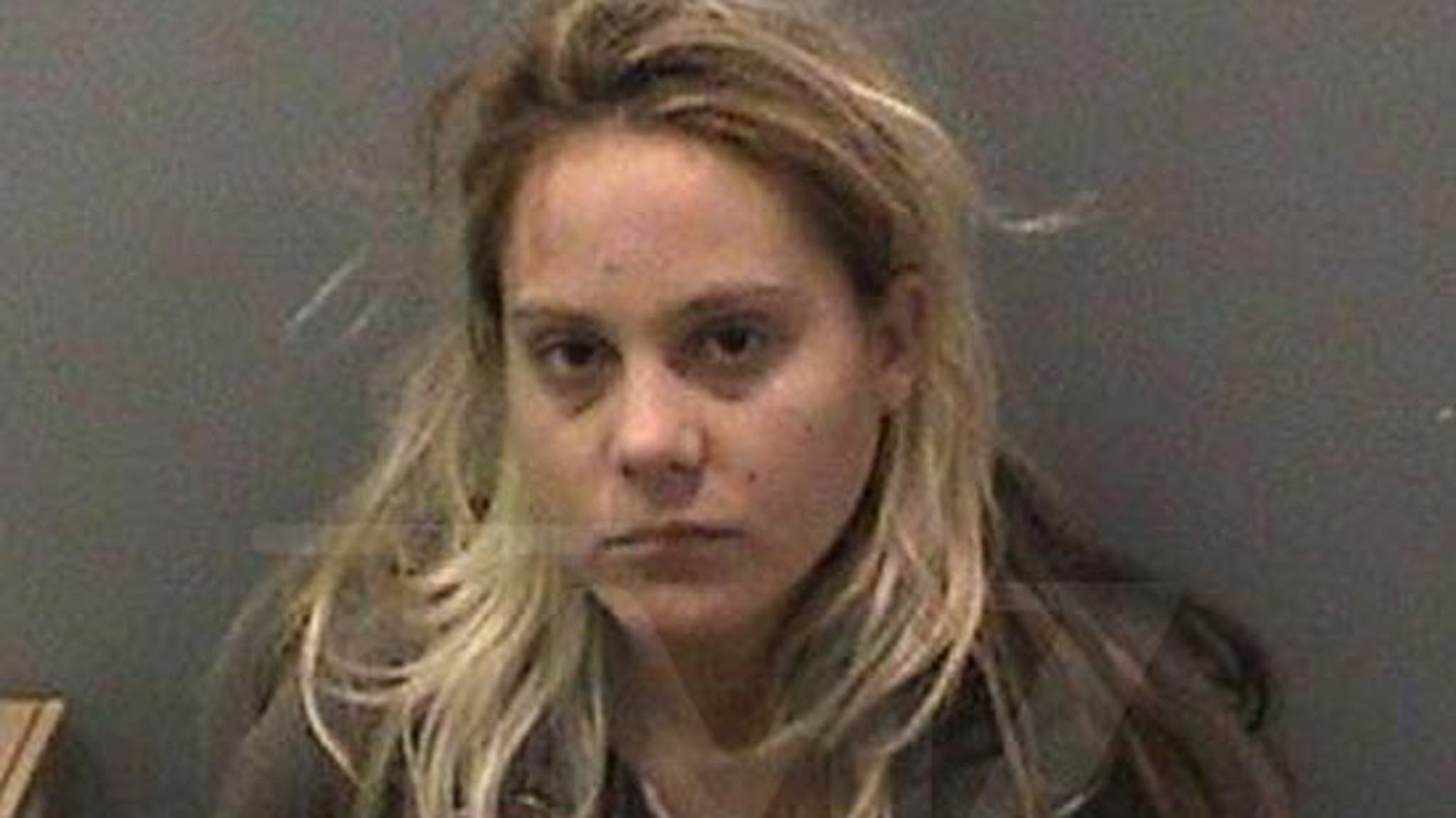 Real Housewives of O.C. Star Arrested for PUNCHING A COP!!! image