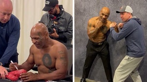 Mike Tyson Goes Shirtless For Autograph Signing, Shows Off Ripped Physique