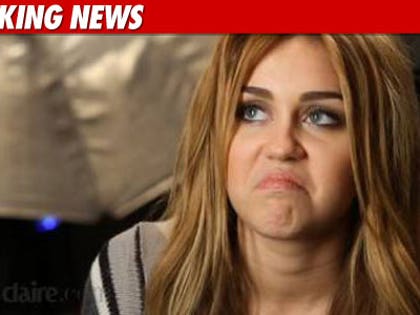 0209_miley_cyrus_breaking
