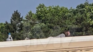 071324-alleged-shooter-on-roof-primary