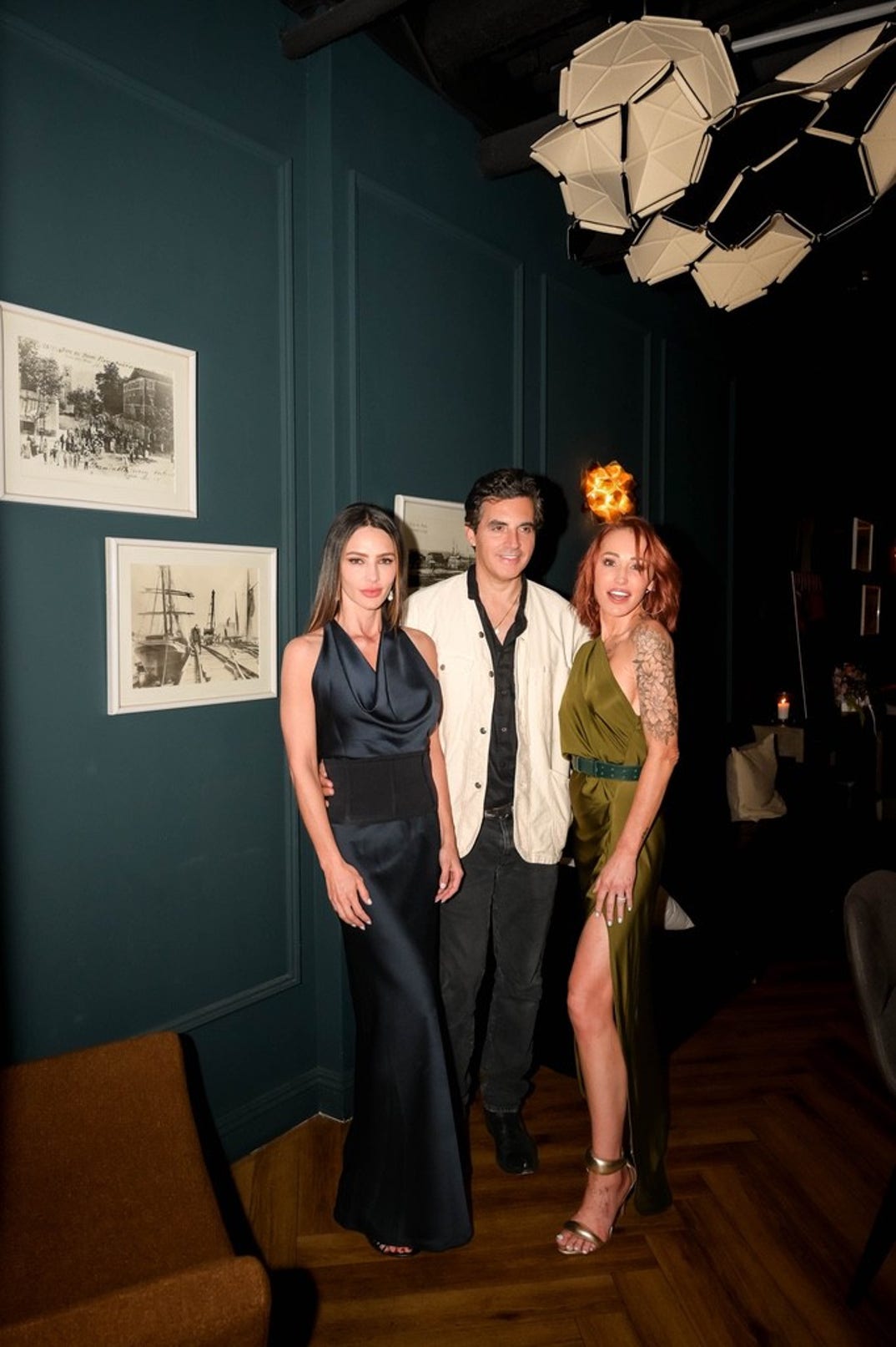 Television personalities Sandra Vergara and Mary Bonnet pose with internationally acclaimed Israeli-American fashion designer Yigal Azrouël