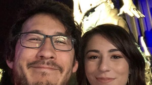 Markiplier and his wife Amy Nelson are seen posing for a selfie.
