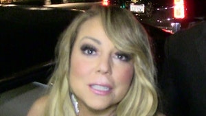 Mariah Carey's Ass't Sues Claiming Manager Butt Slapped, Used Racist Language