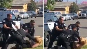 Cops Stop Fellow Officer From Punching Woman, Punching Cop Placed on Leave