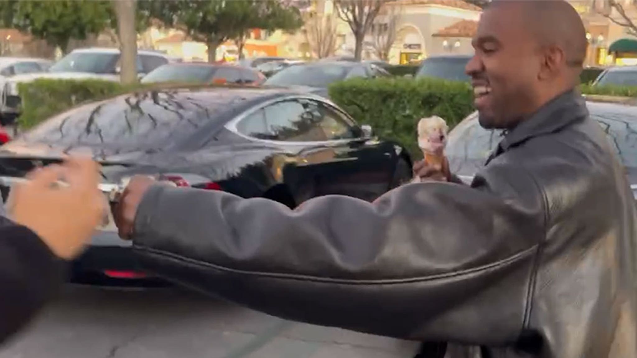 Kanye West Fist Bumps Fan Who Calls Him 'Amazing Father' thumbnail