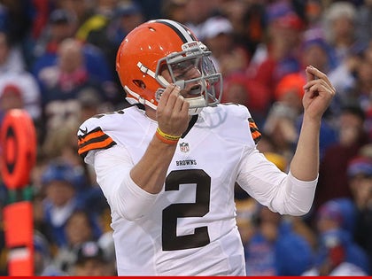 0617-johnny-manziel-money-sign-GETTY-01