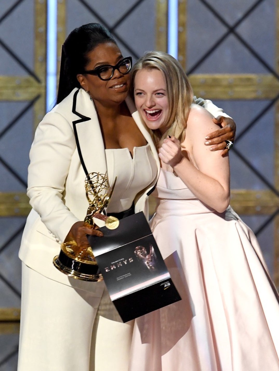 Elisabeth Moss accepts Outstanding Drama Series for 'The Handmaid's Tale' from Oprah Winfrey -- 69th Annual Primetime Emmy Awards
