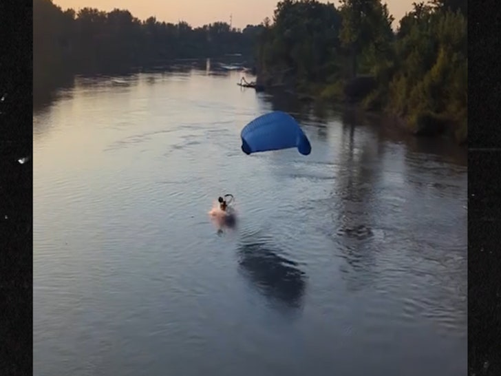 071025_powerglider_hits_powerlines_water_primary