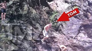 Tom Brady Throws Himself Off a Cliff [PHOTOS]