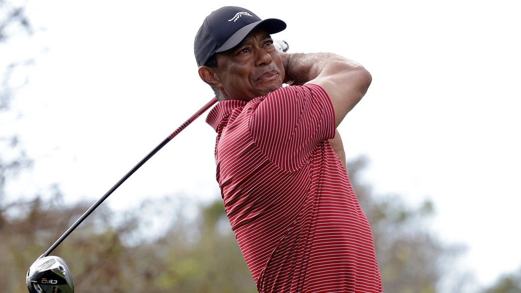 0330-Tiger-Woods-Swingin-Shots-PRIMARY