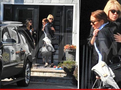 1010_dina_lindsay_hugging_wm