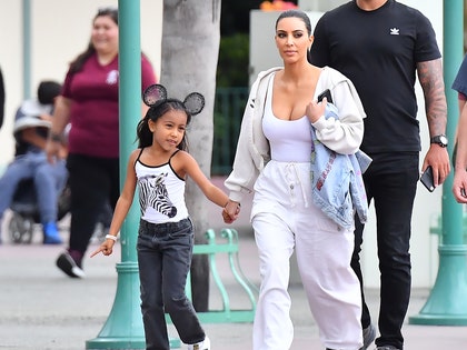 0522-kim-and-north-take-disneyland-primary-mega