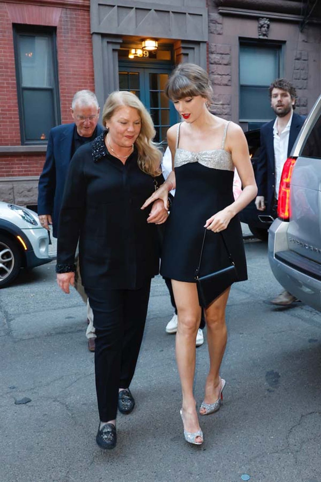 Taylor, her mother Andrea, Father Scott, and brother Austin out for dinner in Manhattan.
