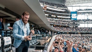 Conor McGregor Meets the Dallas Cowboys, Hands Out Bottles of His Whiskey