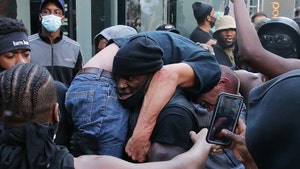 Black Lives Matter Protester Carries Counter-Protester to Safety
