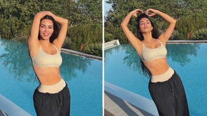 Kim Kardashian Fires Back After People Claim Belly Button Photoshop